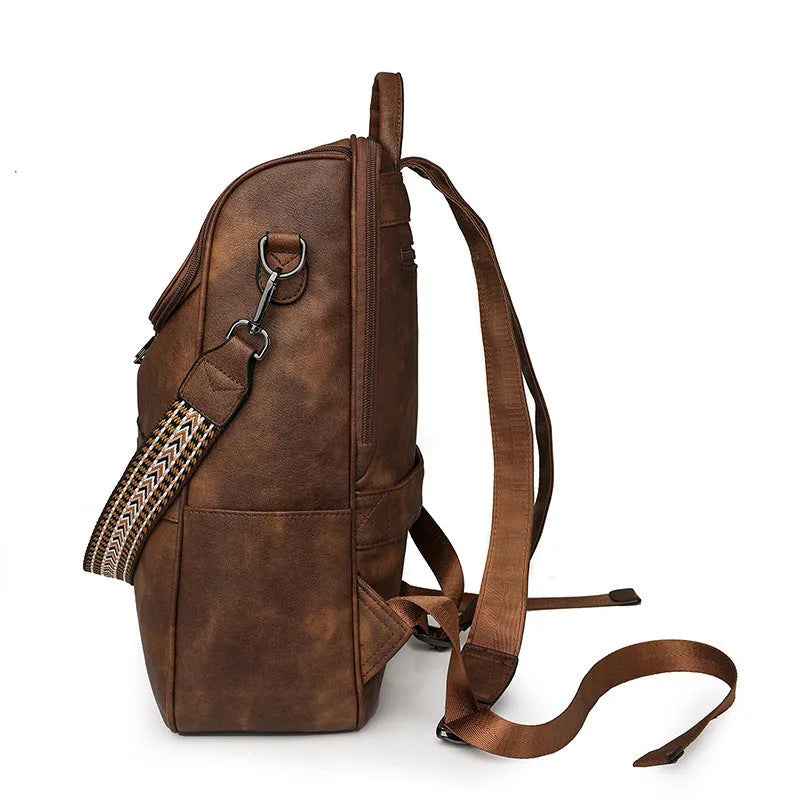 Retro college style PU backpack with curved shoulder straps, shown in one of six available colours.