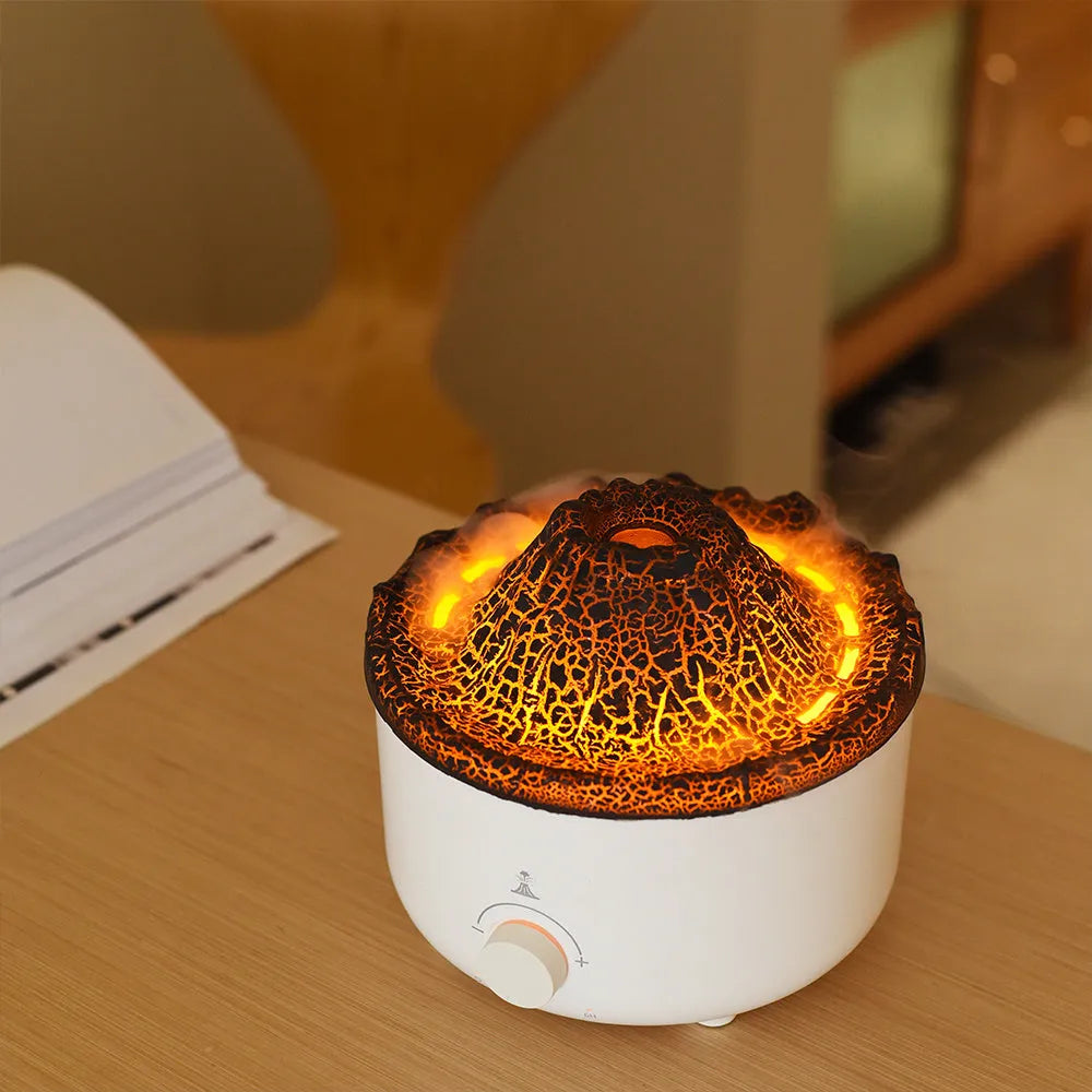White simulated flame volcano humidifier with remote control showing orange and blue lighting effects