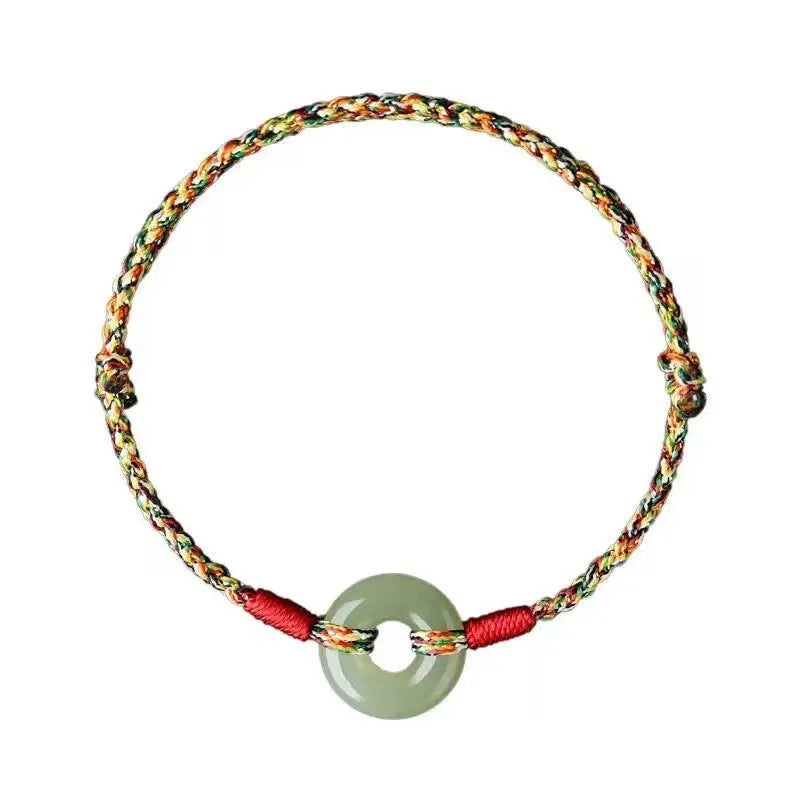Handmade colourful rope bracelet with peace buckle on woven braided design