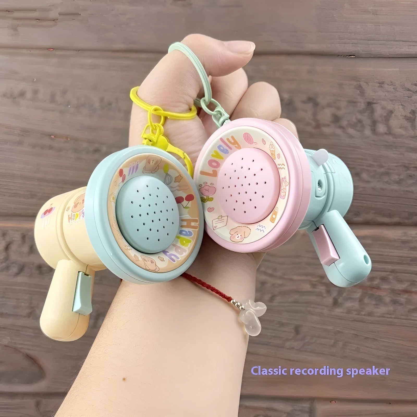 Green and yellow plastic cartoon horn keychain ornament with cute style design