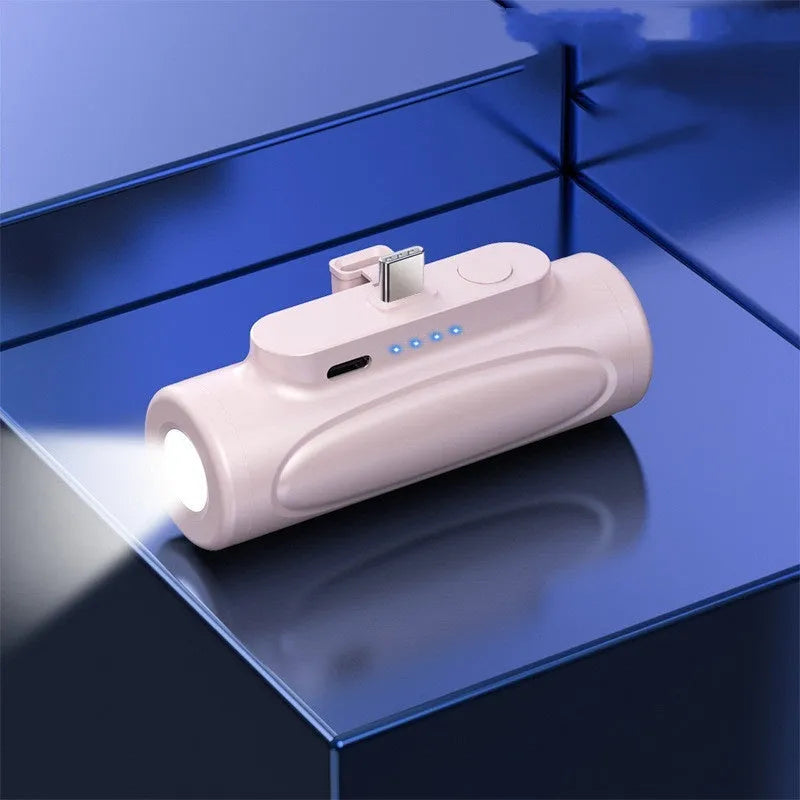 Black Creative Glare Power Bank showing USB-C port and LED flashlight on a compact plastic body.