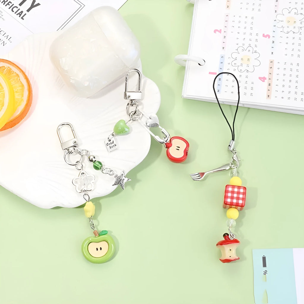 Fruit-themed mobile phone earphone bag pendant keychain in plastic/resin with rope attachment
