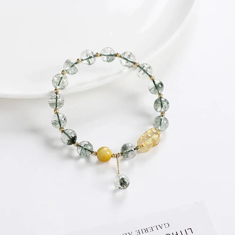 Green phantom quartz crystal bracelet with 8mm beads and gold rutilated quartz inclusions