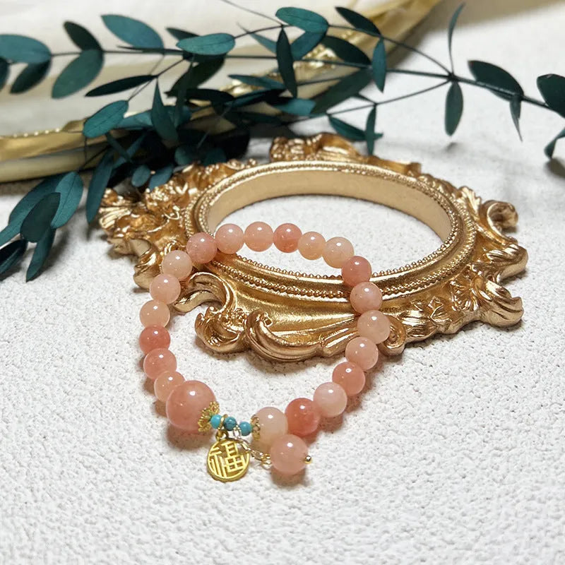 Pink agate natural stone bracelet with adjustable alloy chain and lobster clasp fastening