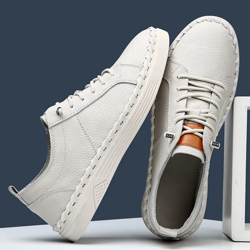 Men's beige cowhide sneakers with mesh lining and stitching details