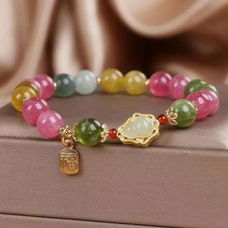 Women's bracelet with colourful tourmaline beads and electroplated gourd blessing card and flower charms