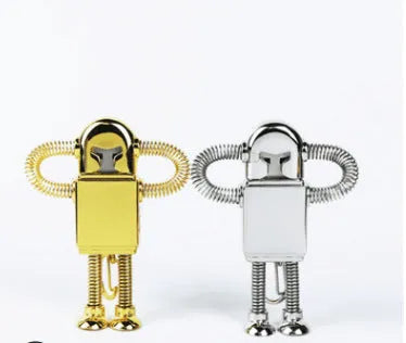 Metal robot U disk in silver with spring-extended USB connector on a white background