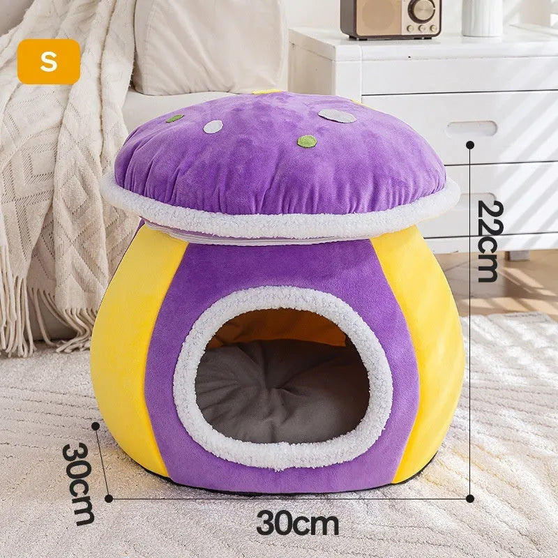 Grey mushroom-shaped plush cat bed with a detachable blanket inside, shown on a wooden floor.