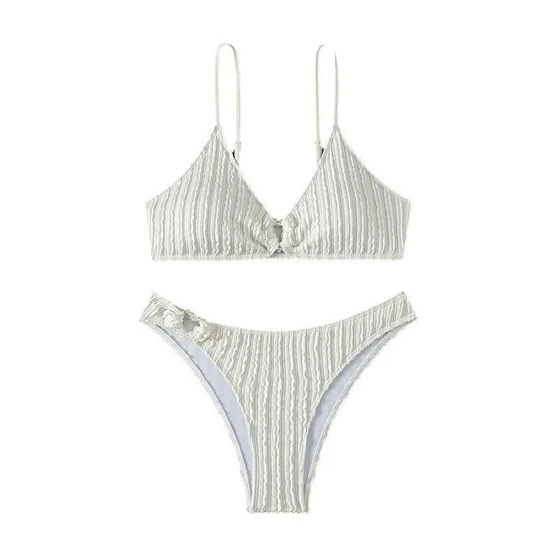 White women's swimsuit with V-neck top and matching shorts for swimming