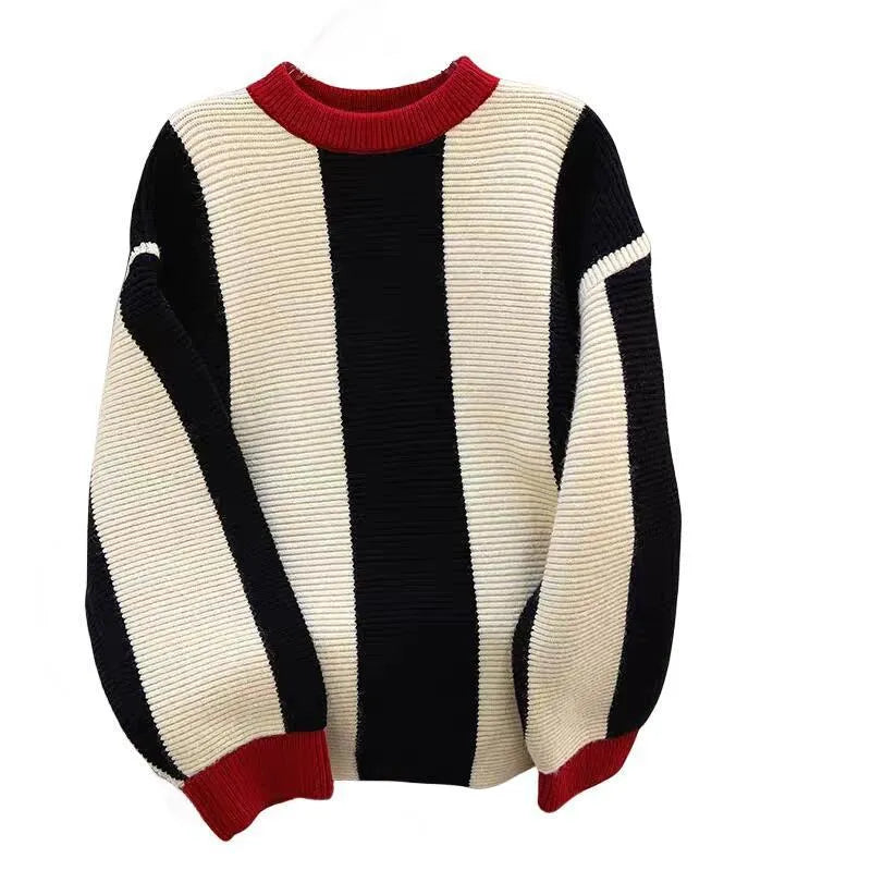 Women's striped cashmere sweater with contrast colours, round neck, and regular sleeves.