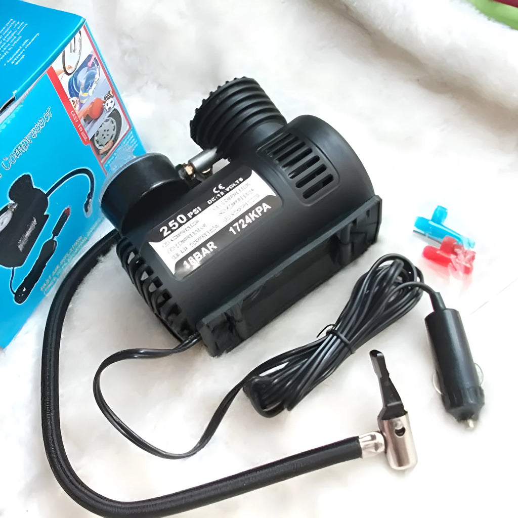 Black plastic 12V mini car air pump for tyre inflation measuring 13.5cm long