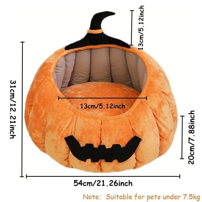 Halloween-themed orange pumpkin-shaped soft plush bed for a cat or small dog, featuring a cartoon devil design.