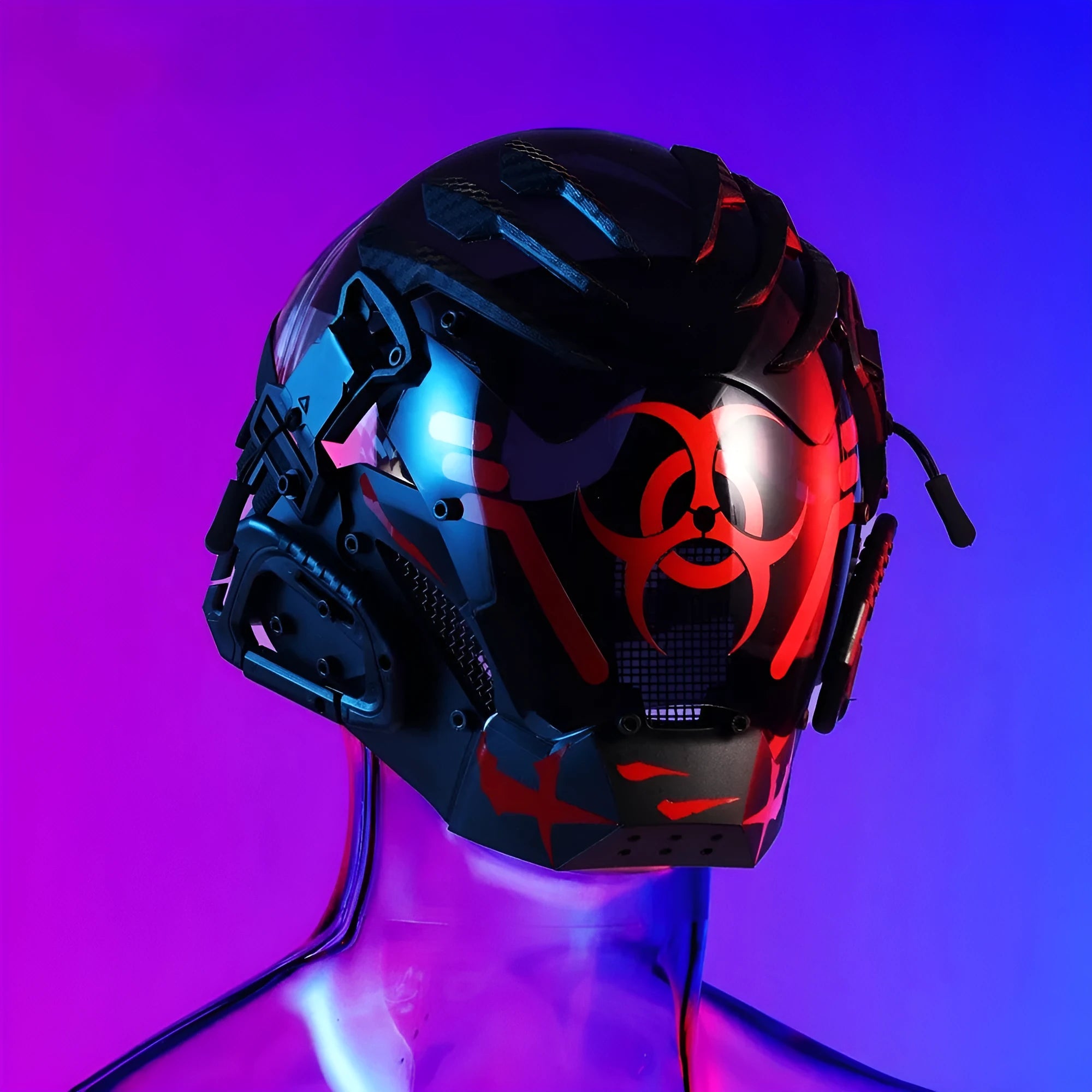 Black full-face polymer helmet with tech design, shown on a stand against a dark background.