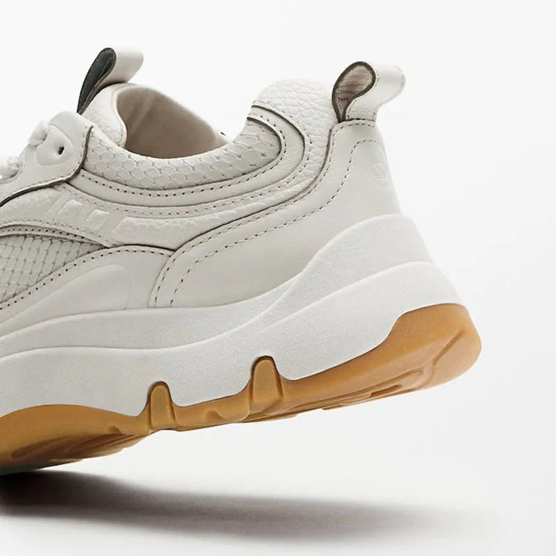 Women's beige round toe casual sneakers with cross straps, thick sole, and top layer cowhide upper