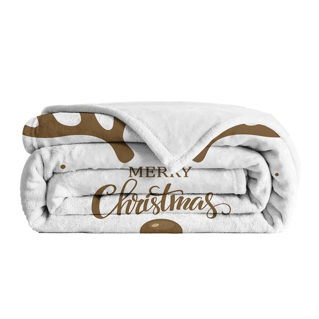 Deer antler pattern Christmas limited edition white flannel velvet blanket on a sofa