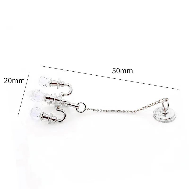 Miniature metal retro photo prop decorations in gold and silver finishes measuring 5x2cm