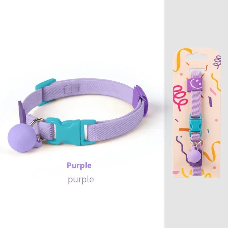 A stretchy, solid-colour polyester dog collar for small breeds, shown in sky blue, adjustable from 22 to 32 centimetres.