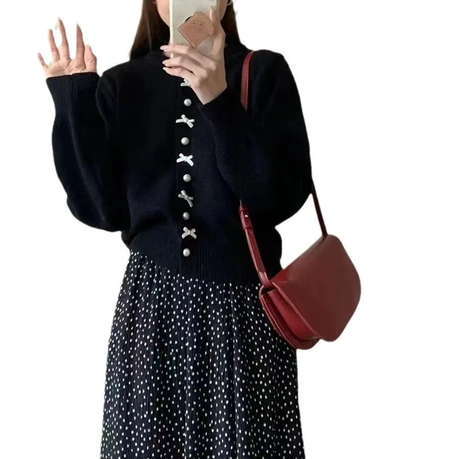 Women's acrylic cardigan with bow detail and pearl button in solid colour