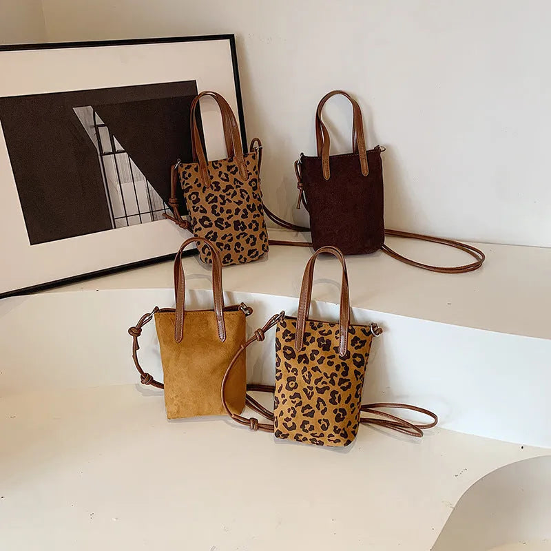 Women's PU crossbody bag in leopard print brown with square vertical shape and 166cm shoulder strap
