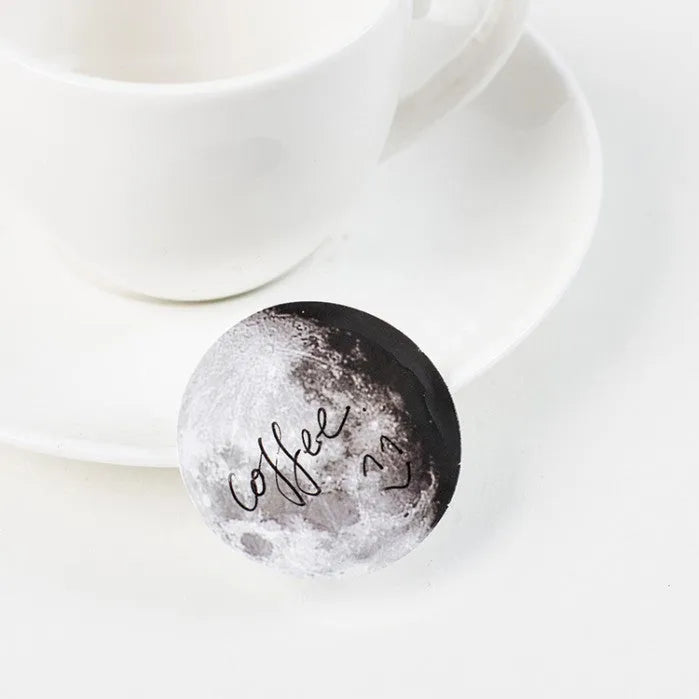 Boxed set of 45 black moon phase and planet calendar self-adhesive stickers for planners.