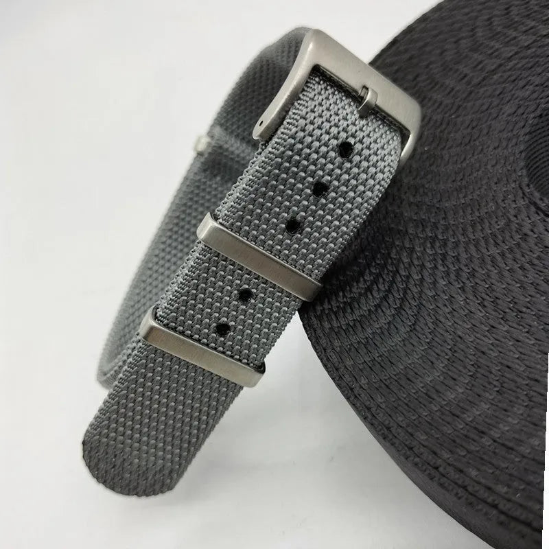 Nylon integrated watch strap in Army Green colour, shown alongside Black, Blue, Khaki, and Gray options.