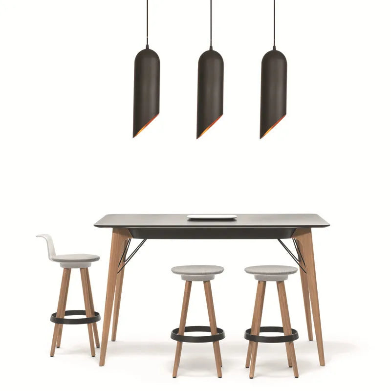 Retro black iron chandelier with multiple light arms hanging from a ceiling