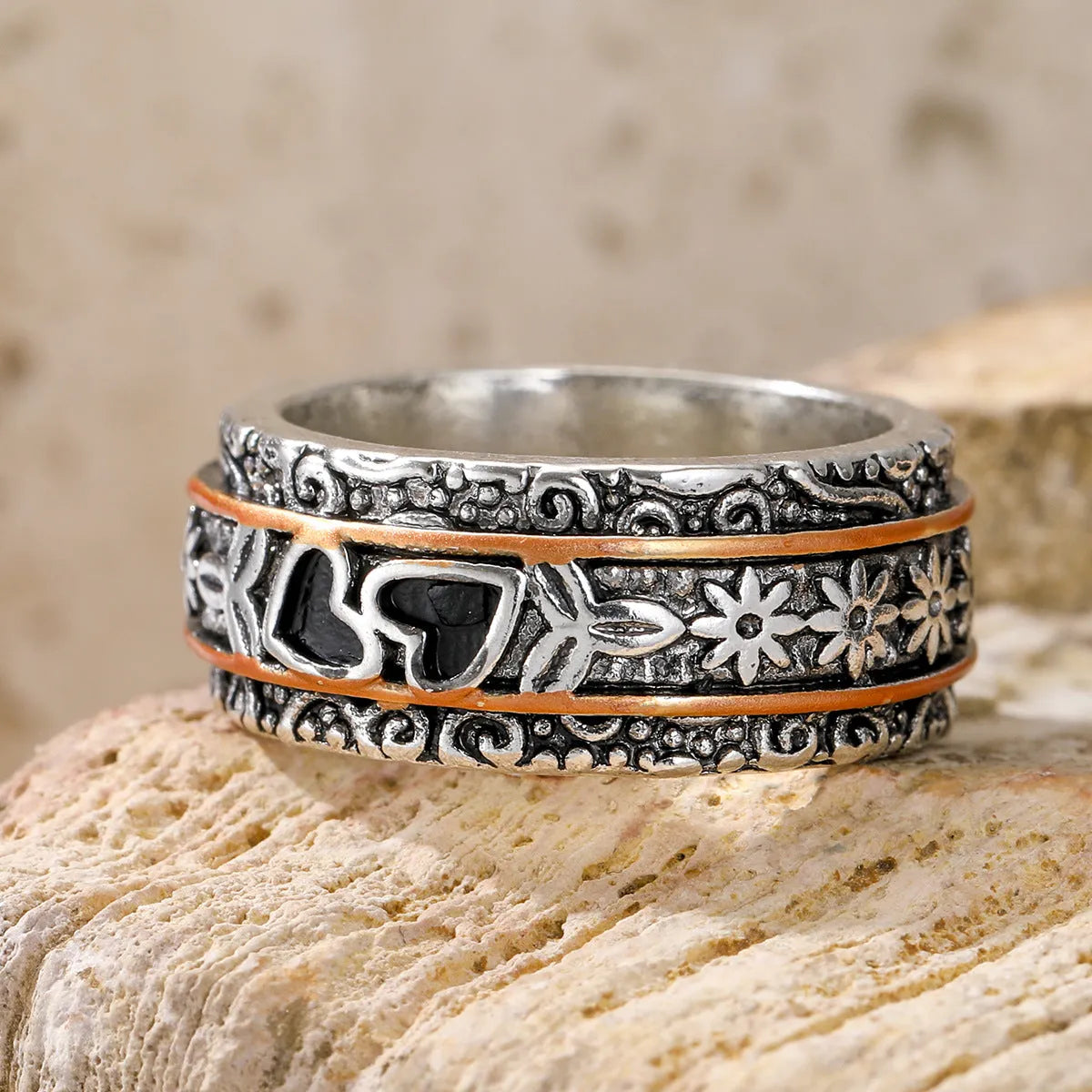 Silver women's personality love wide noodle ring on white background, size option visible