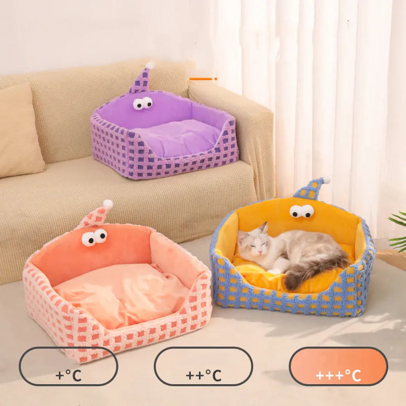 Green triangular pet bed with thick sponge and a removable cover for cats.