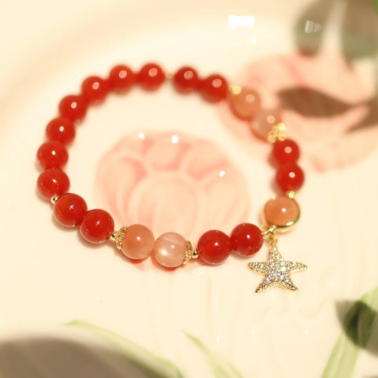 Handmade red agate and Sands Orange Sunstone ethnic bracelet for women with 8mm beads and star design.