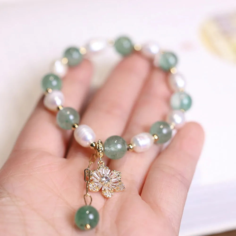Handmade green strawberry freshwater pearl bracelet with peace buckle and hanging flower charm