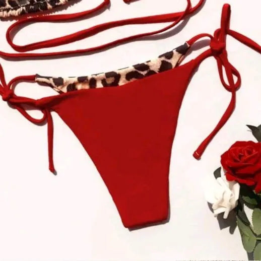 Women's leopard print bikini swimsuit with halter neck and split front design