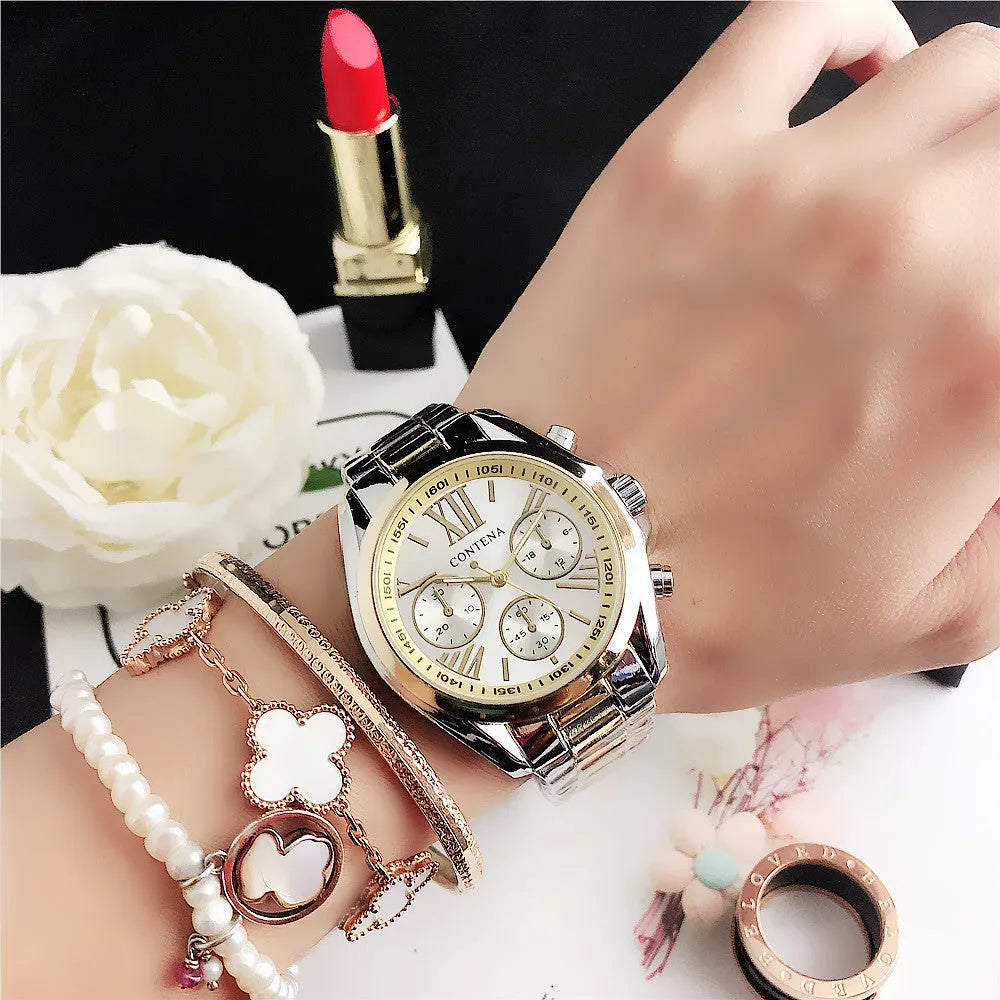 Women's silver rose gold watch with diamond details and mesh strap