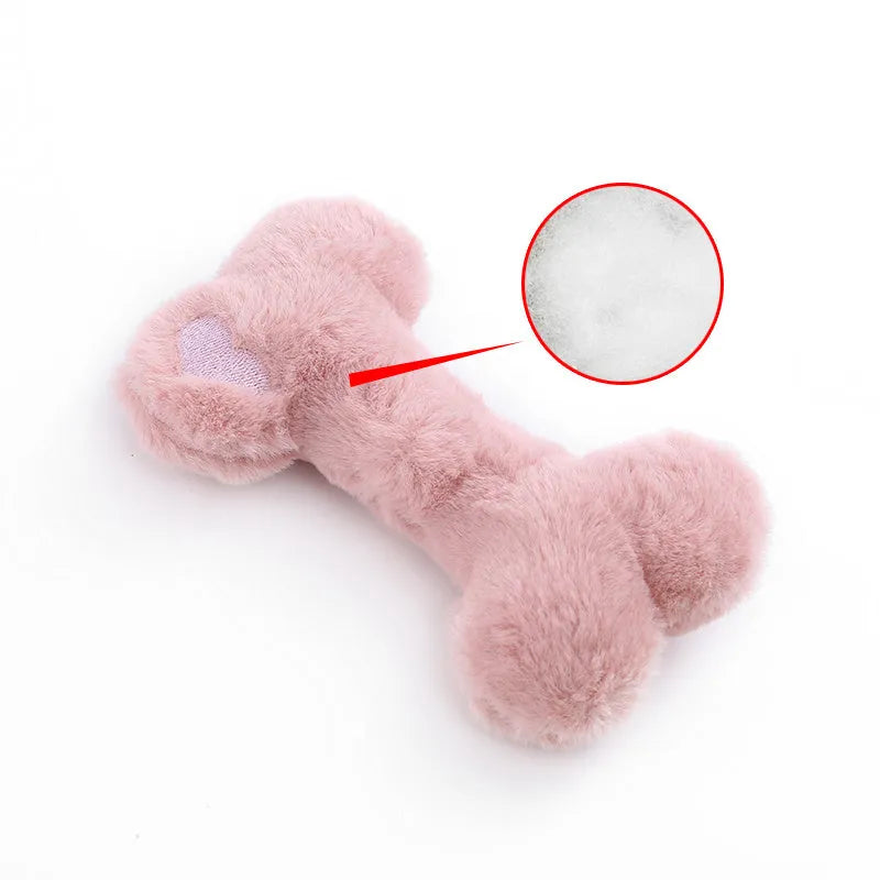 Blue love bone plush dog toy with vocal sound unit and squeaker for interactive chewing play.