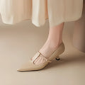 Black women's leather high-heeled shoes with a square toe and a 6-8 cm rubber sole.