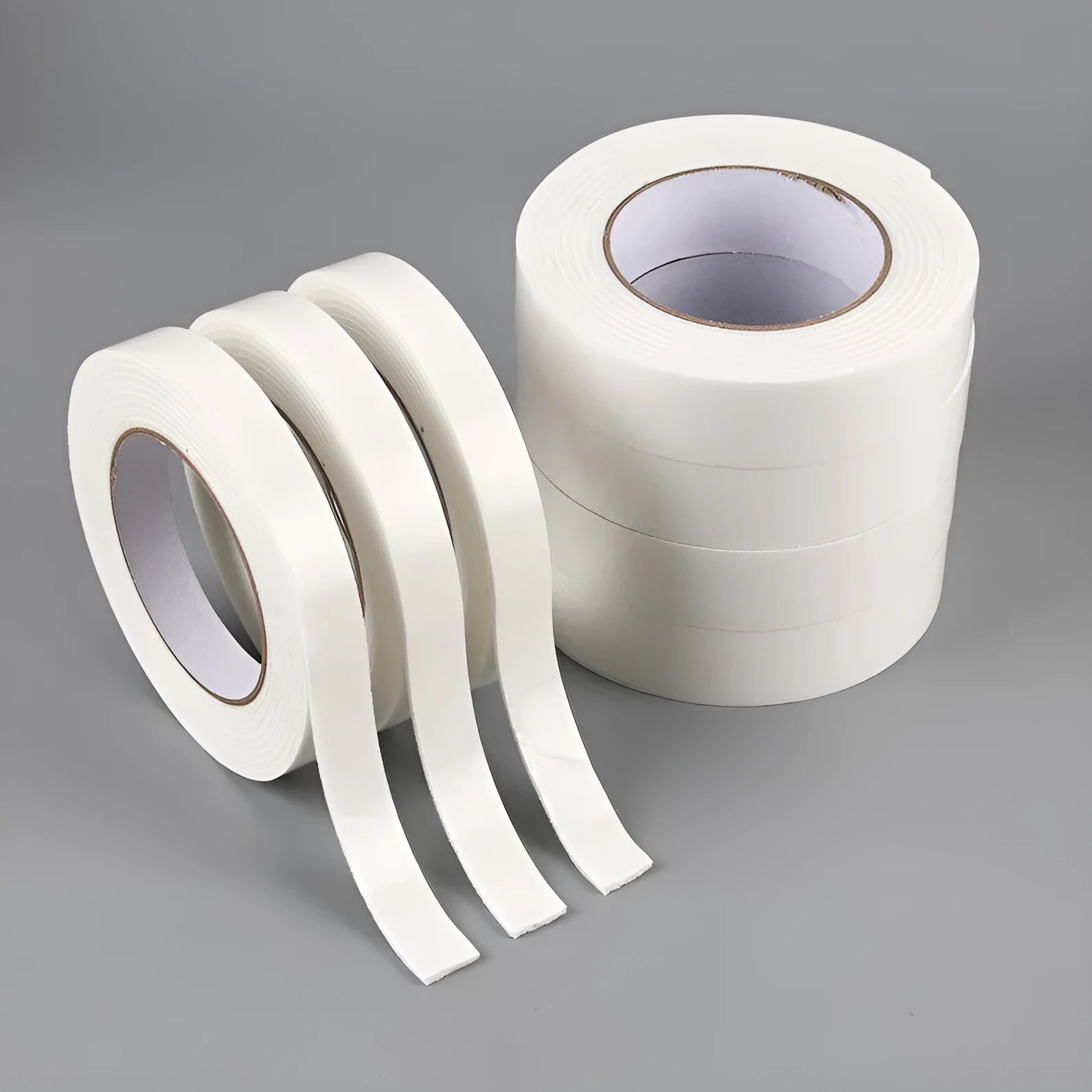 Roll of 3mm thick white foam double-sided adhesive tape with clear BOPP liner, showing width options.