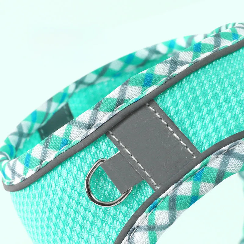 Step-in no-pull dog harness with breathable mesh, quick-release buckle, reflective strips, and attached 1.2m leash.
