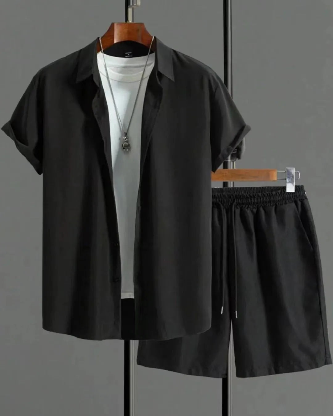 Men's black and white Jacquard short sleeve suit set with matching shorts on hanger