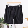 Men's quick-drying polyester sports shorts in straight cut design with chemical fibre blend