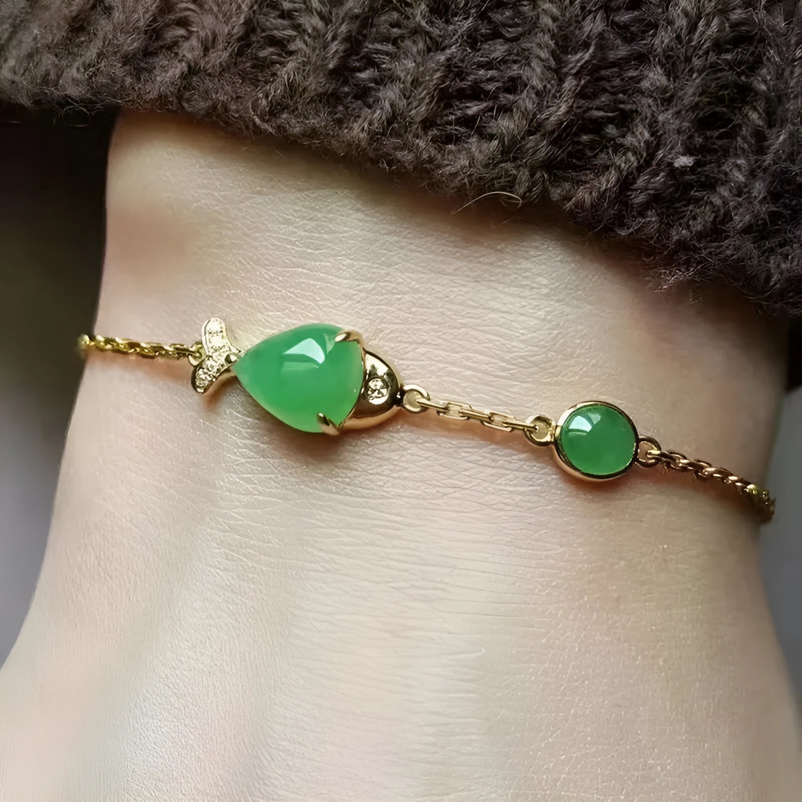 Yellow gold electroplated women's bracelet with retro style design on simple background