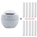 Mini USB aroma diffuser humidifier with wood grain finish, one fog outlet, and mechanical controls on a white background