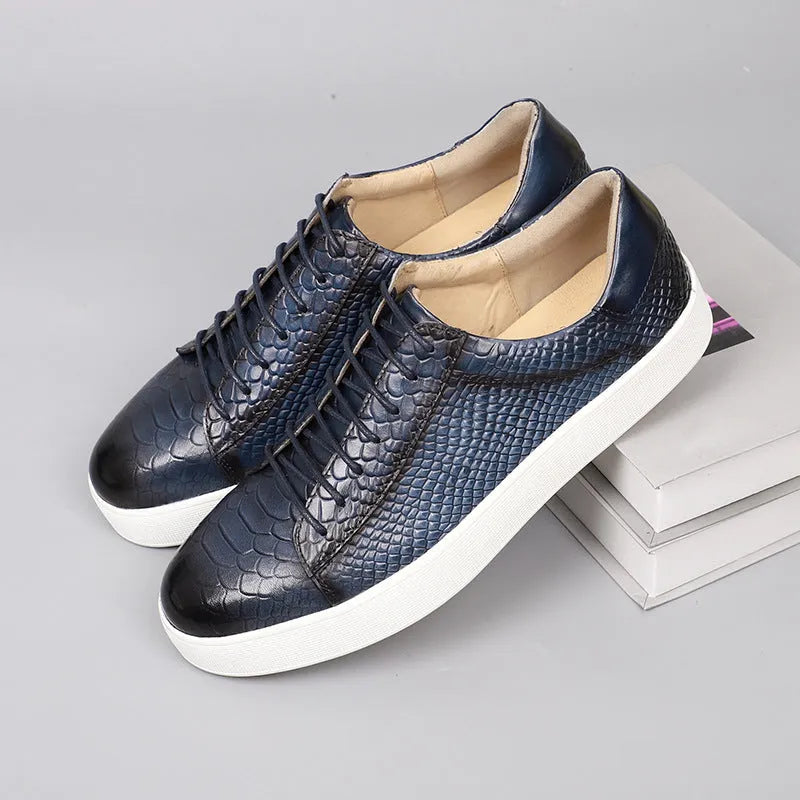 Men's lace-up embossed flat casual leather shoes in brick red with round toe and rubber sole
