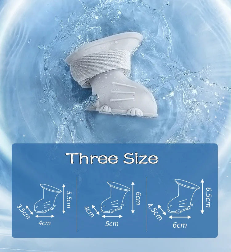 Set of four waterproof silicone dog rain boots in dark blue, gray, light blue, and pink on a white background