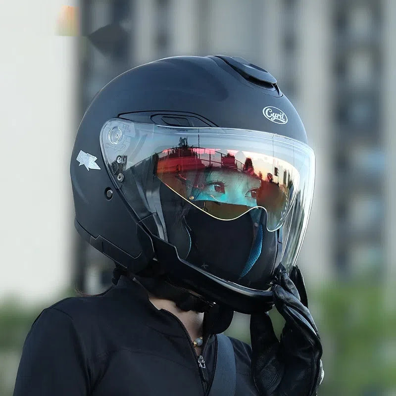 Summer motorcycle half helmet with double visor in matte black finish on light background