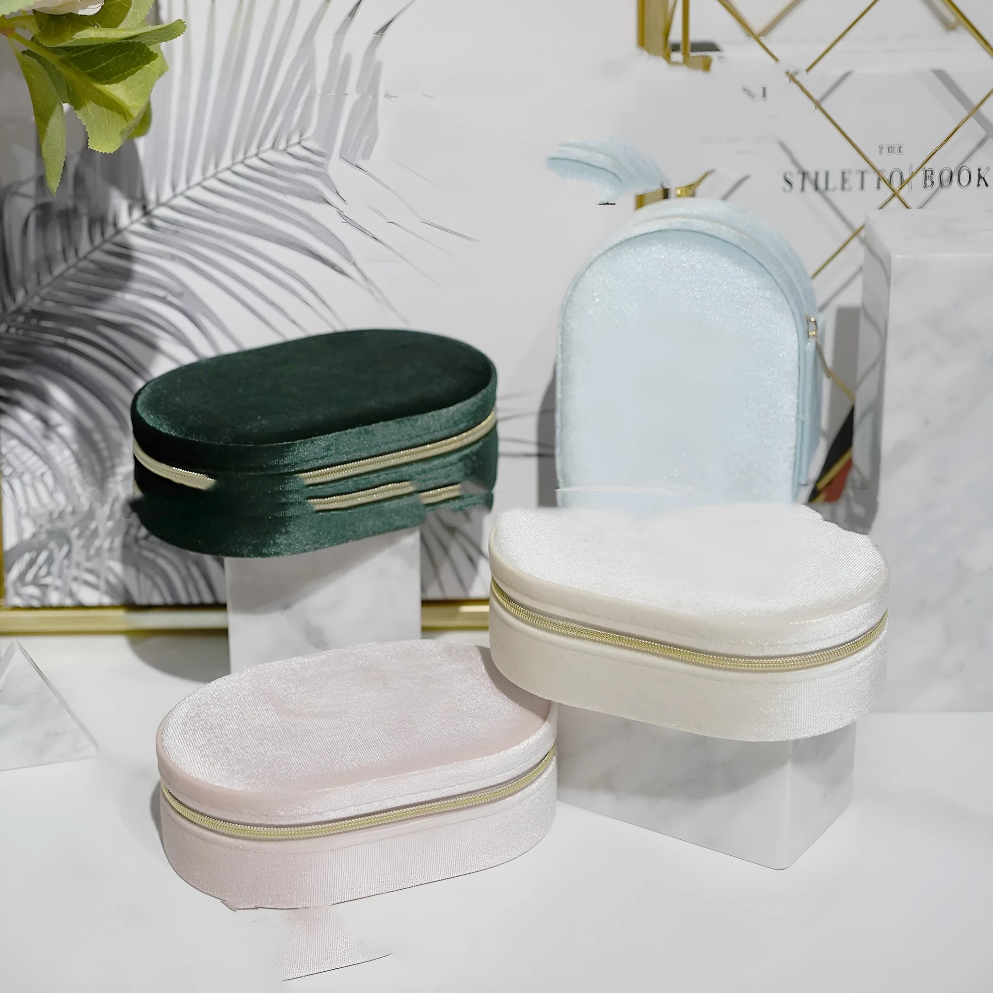 Oval velvet jewellery storage box in multiple colours with flannel interior, showing dimensions 15x10x5cm.