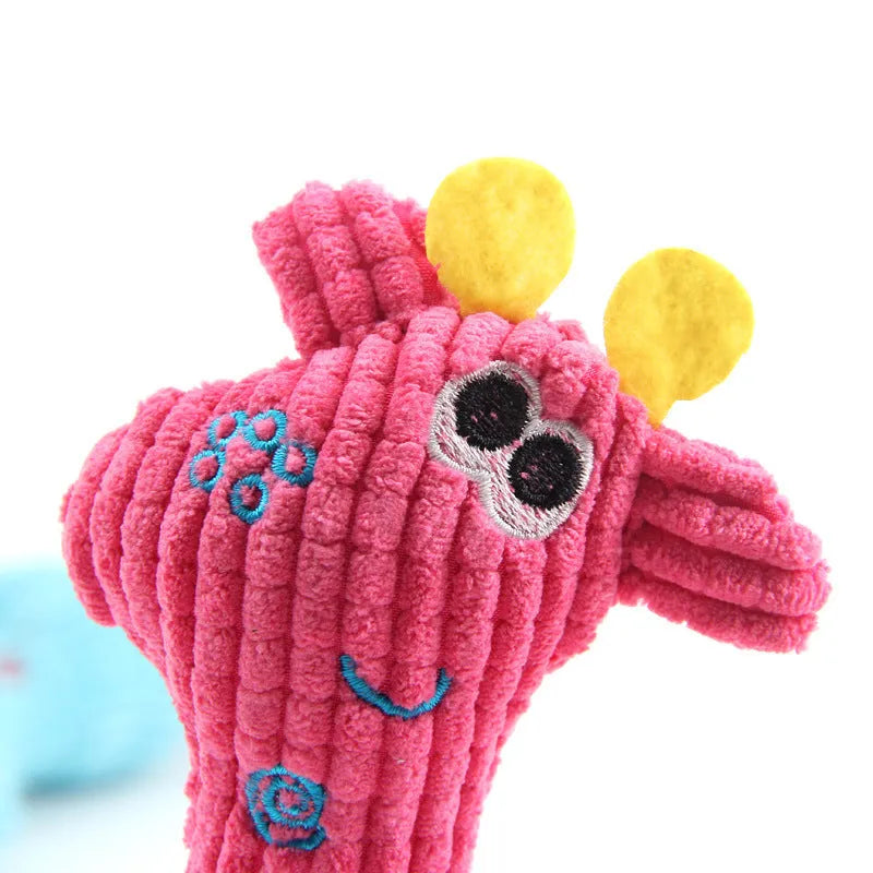 Blue plush deer dog toy with corn kernel texture and a squeaker, on a white background.