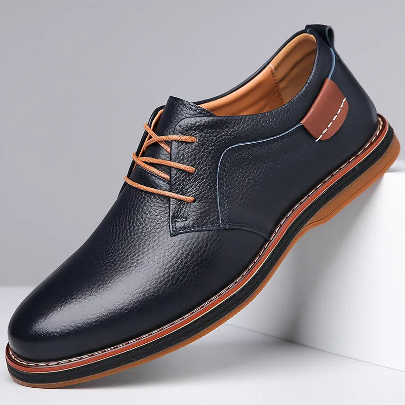 Men's business casual shoes in first layer cowhide, flat heel and round toe, black blue or brown