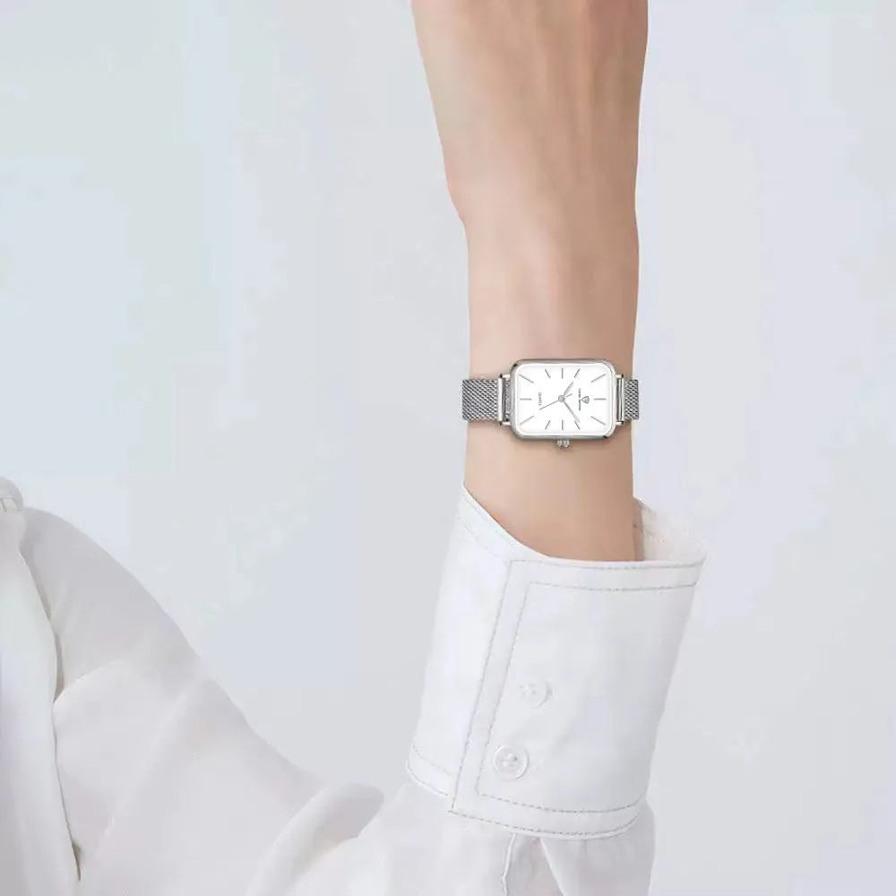 Rose gold or silver women's waterproof quartz watch with alloy case and woven steel strap.