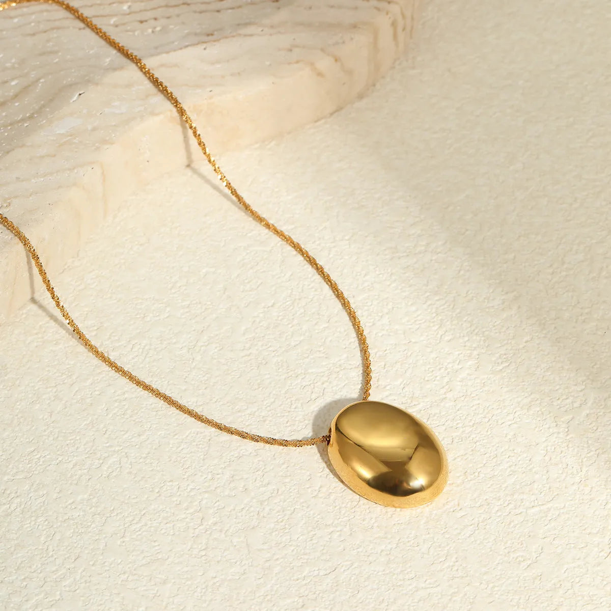 Gold geometric pendant necklace on stainless steel chain with adjustable 41-50cm length