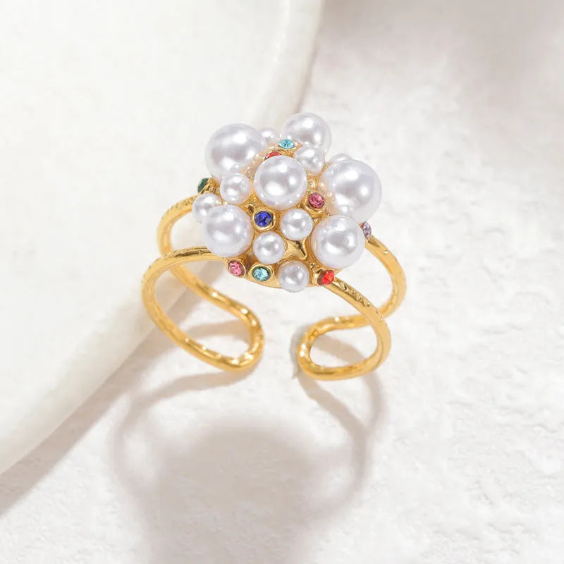 Women's adjustable open mouth ring with pearl and zircon decorative elements on stainless steel