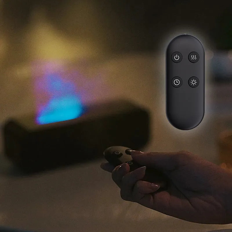 Black Flame Dynamic Aroma Diffuser with LED flame light display and remote control on a desk.